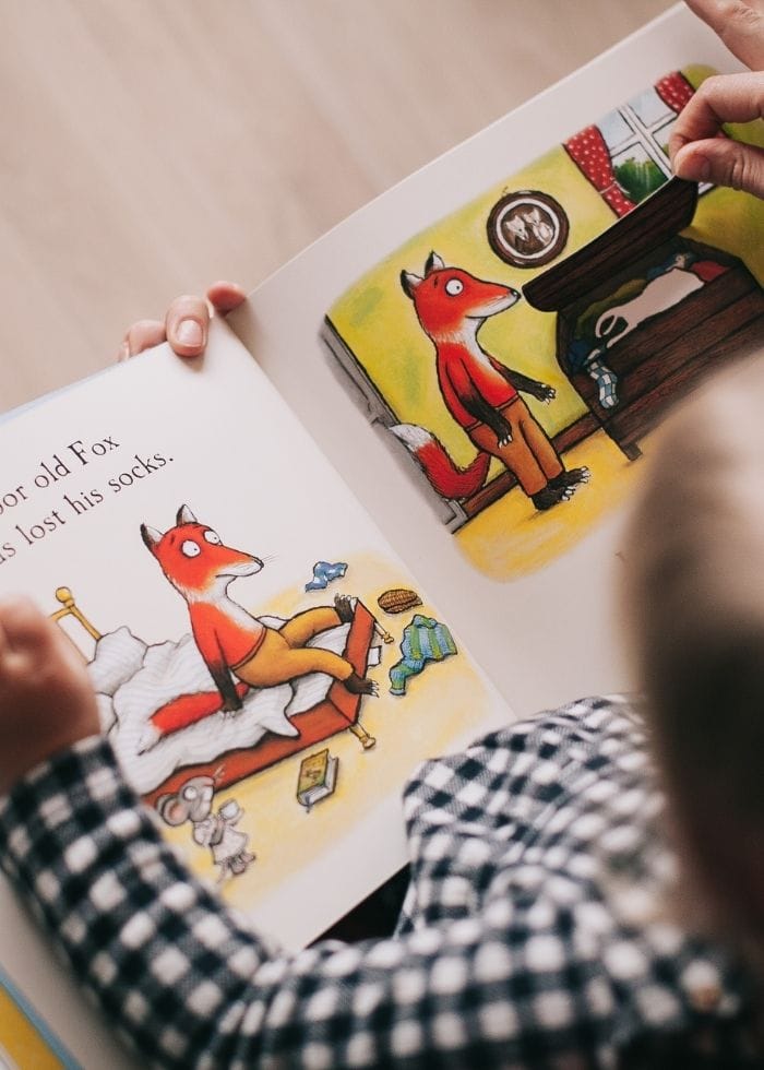 baby reading a book