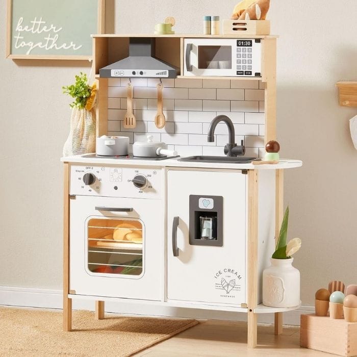 white wooden play kitchen