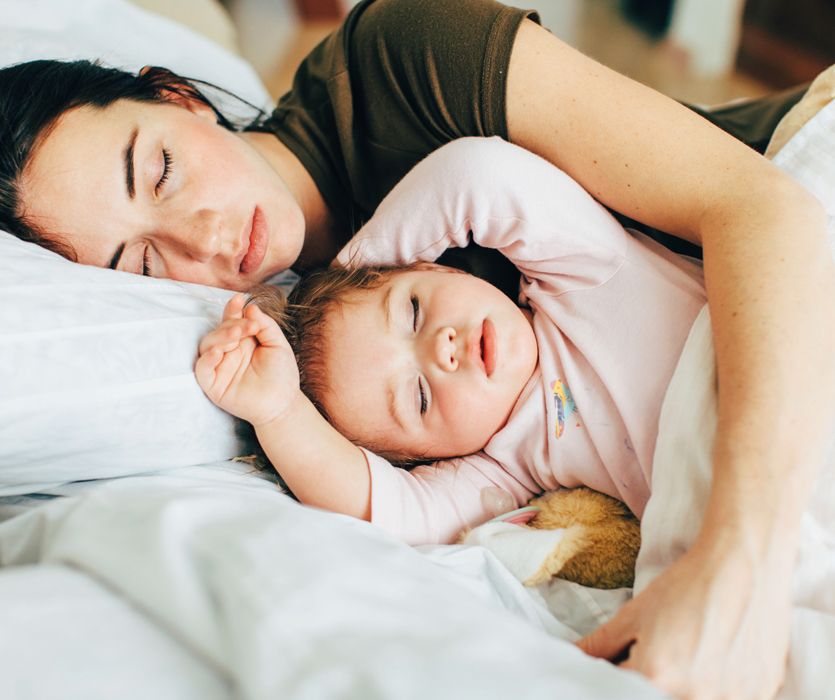 Slowing Down to Appreciate the "Lasts": mom snugging her baby while they sleep