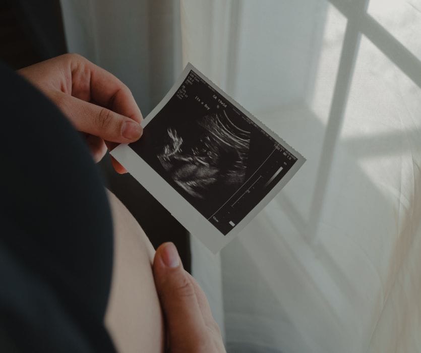 Pregnant mom dealing with gender disappointment as she views her ultrasound of her baby