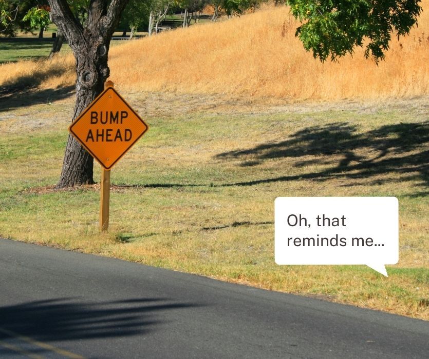 A yellow road sign says BUMP AHEAD. A speech bubble says, Oh, that reminds me... signifying pregnancy.