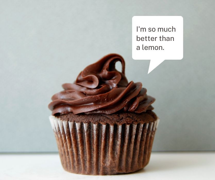 Chocolate cupcake with a speech bubble that says: I'm so much better than a lemon.