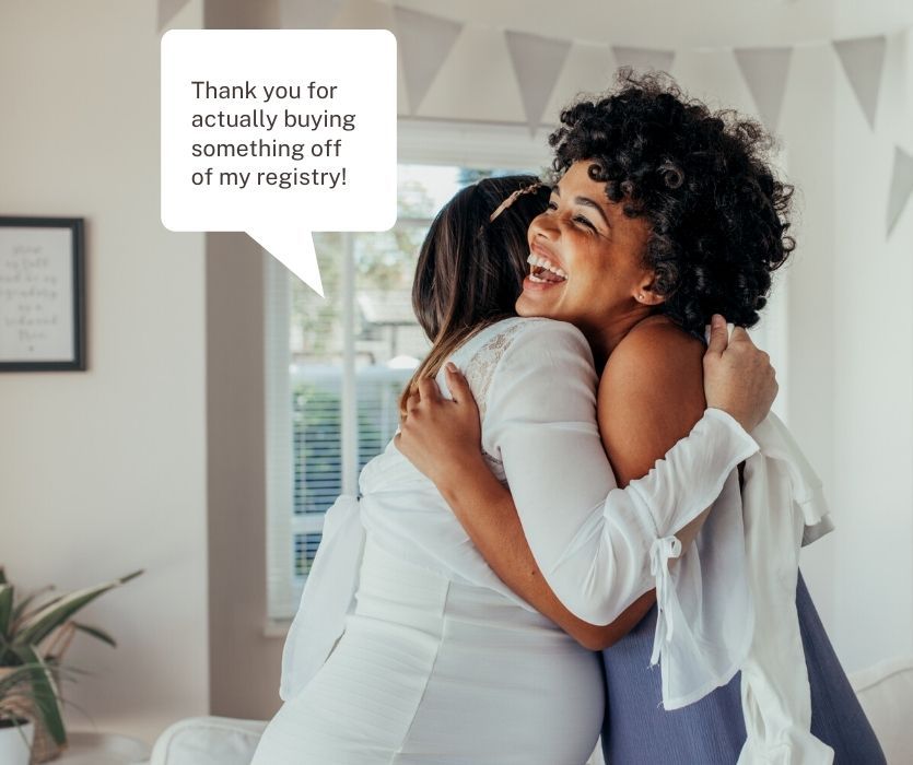 A pregnant woman in white hugging a friend. Speech bubble says: Thank you for actually buying something off my registry!