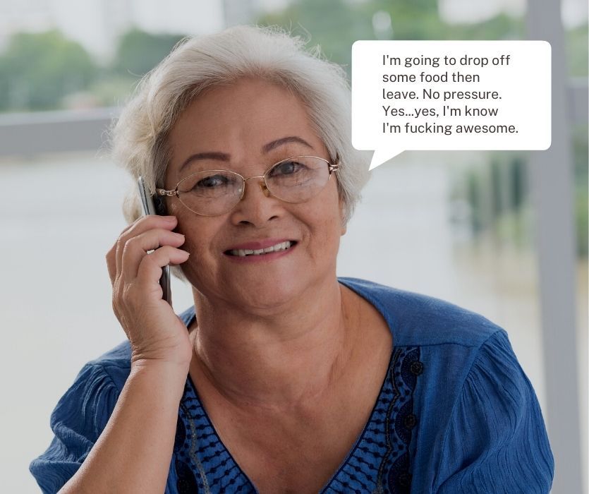 An older woman smiles while on the phone. Text bubble: I'm going to drop off some food then leave. No pressure.