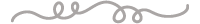 Decorative grey horizontal line with four elegant loops and wave-like flourishes on a black background.