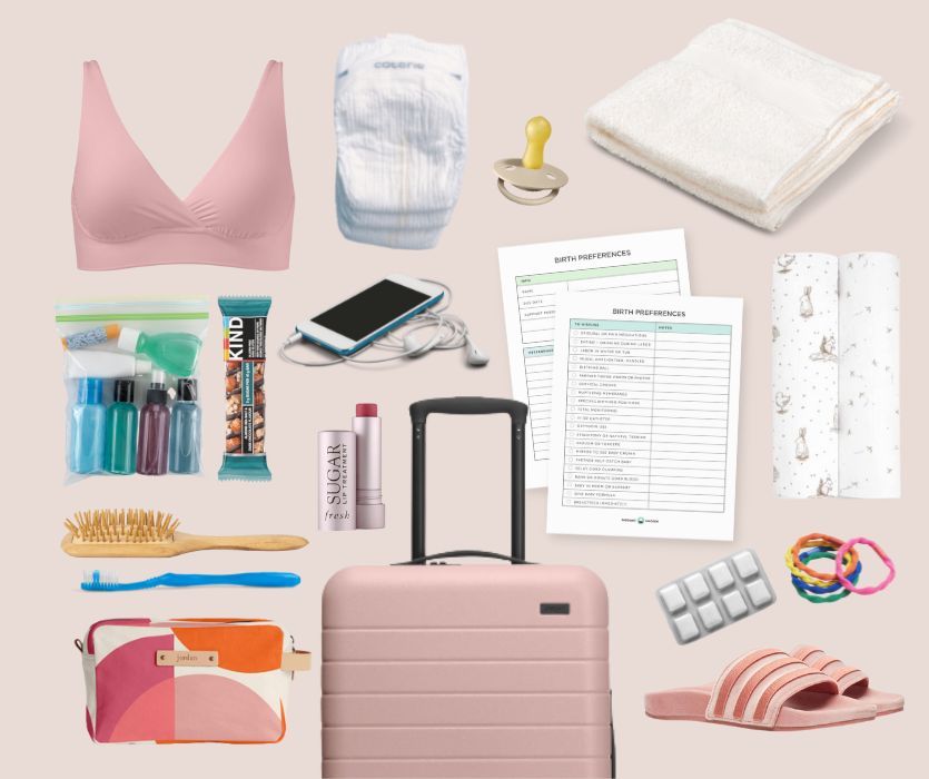 A pink suitcase surrounded by childbirth essentials including a nursing bra, diaper, toiletries, snacks, and birth plan.