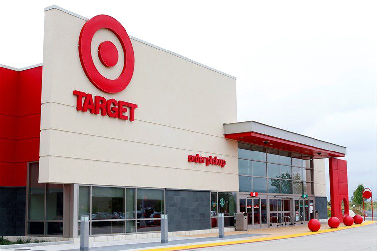 Exterior of a Target store with a large bullseye logo, red signage, and storefront glass windows.